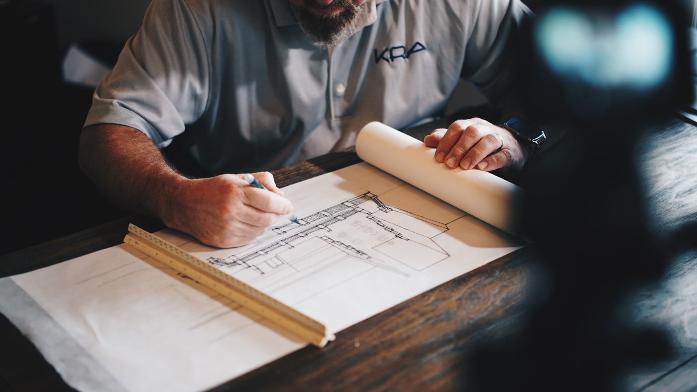 Project plans and drawings on a desk