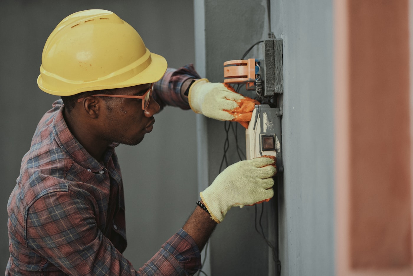 Technician servicing equipment at a residential property